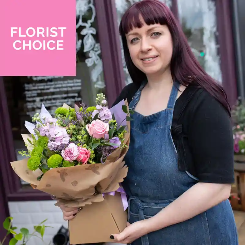 A beautiful Mother's Day Florist Choice bouquet featuring a hand-selected mix of fresh seasonal flowers in vibrant colors, expertly arranged by a skilled florist. Perfect for a heartfelt and unique gift, with delivery available across London.