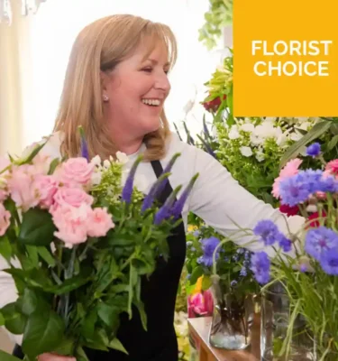 A beautiful Mother's Day Florist Choice bouquet featuring a hand-selected mix of fresh seasonal flowers in vibrant colors, expertly arranged by a skilled florist. Perfect for a heartfelt and unique gift, with delivery available across London.