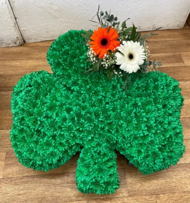 Honouring Loved Ones with Grace: Explore Our Irish Shamrock Funeral Tribute Arrangements at Sun Florist and Events. Celebrate Life with Elegant Floral Designs that Reflect the Deepest Emotions. Contact Us Today for Personalized Tributes that Pay Lasting Homage.