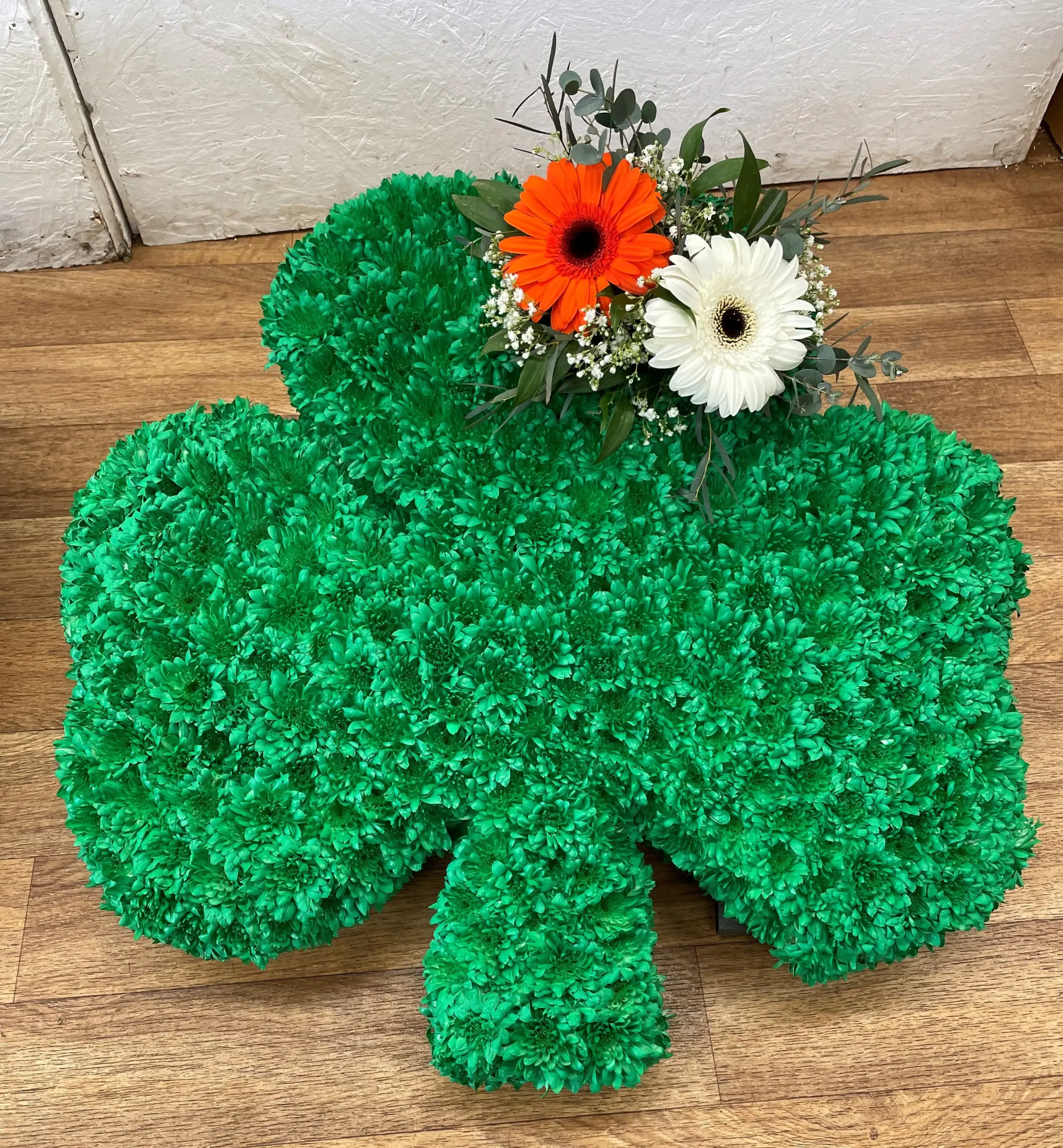 Honouring Loved Ones with Grace: Explore Our Irish Shamrock Funeral Tribute Arrangements at Sun Florist and Events. Celebrate Life with Elegant Floral Designs that Reflect the Deepest Emotions. Contact Us Today for Personalized Tributes that Pay Lasting Homage.